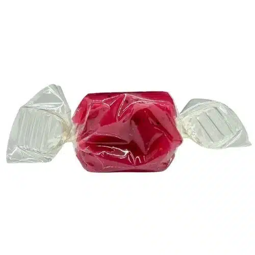 A single wrapped blueberry Derived Creations Delta 9 CBD taffy, showing its rich berry color and soft texture for this 2:1 THC to CBD edible.