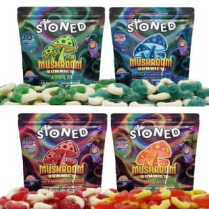 Four varieties of Stoned Amanita Mushroom Gummies. Green Apple, Blue Raspberry, Watermelon, and Peach, shown in colorful 10-count bags with matching gummy rings.
